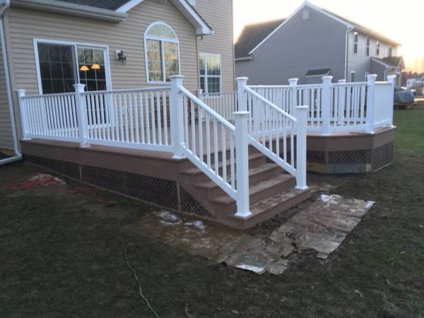 a new deck behind a residential home